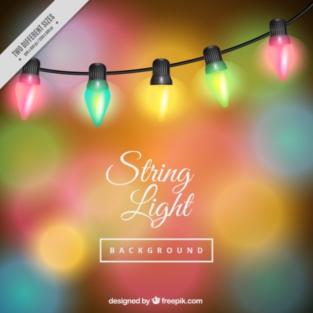 Gratis vector gekleurde bokeh achtergrond met lichtslingers