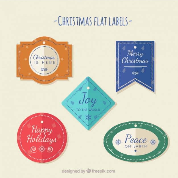 Gratis vector gekleurde kerst platte labels