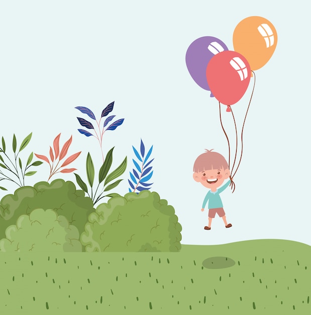 Gelukkige kleine jongen met ballonnen helium in het landschap
