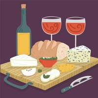 Glazen wijn en cheeseboard-snack
