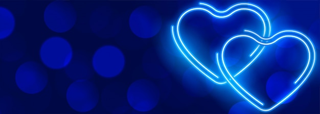 Gloeiende neon blauwe harten bokeh banner