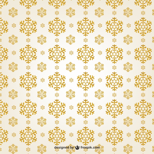 Gratis vector gouden sneeuwvlokken patroon