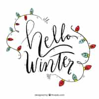 Gratis vector hallo winter achtergrond met bloemen belettering