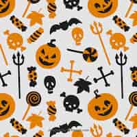 Gratis vector halloween elementen patroon in oranje en zwarte kleuren