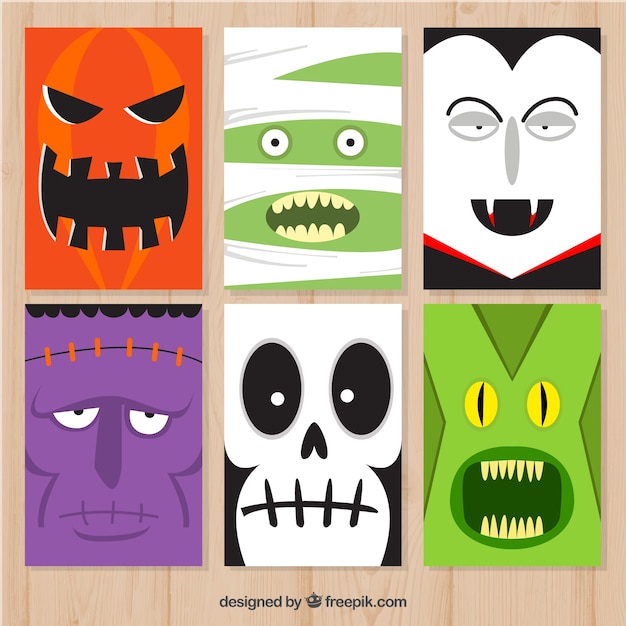 Gratis vector halloween kaarten met grappige monsters