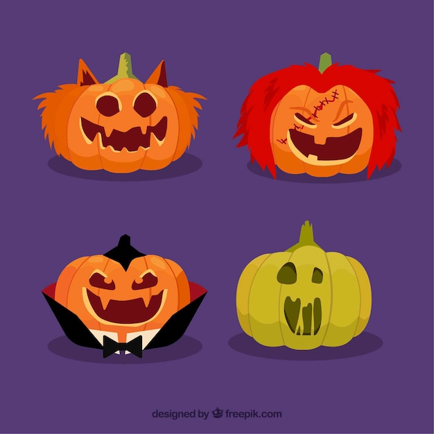 Gratis vector halloween pompoenen met kostuums