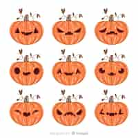 Gratis vector hand getekend halloween pompoen collectie