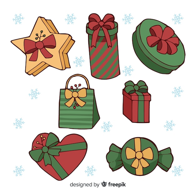 Gratis vector hand getekend kerstcadeau collectie