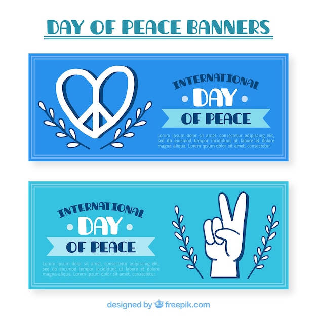 Gratis vector hand getekende banners voor de dag van vrede