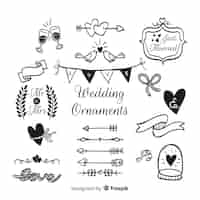 Gratis vector hand getrokken bruiloft ornamenten collectie