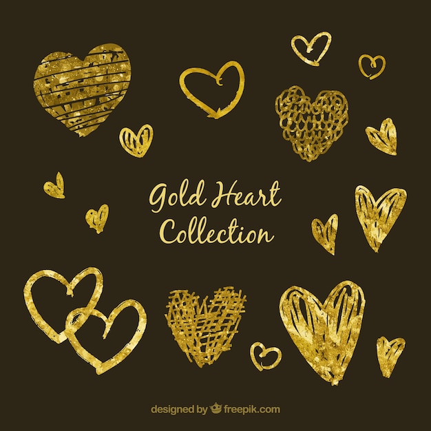 Gratis vector hand getrokken gouden hart collectie