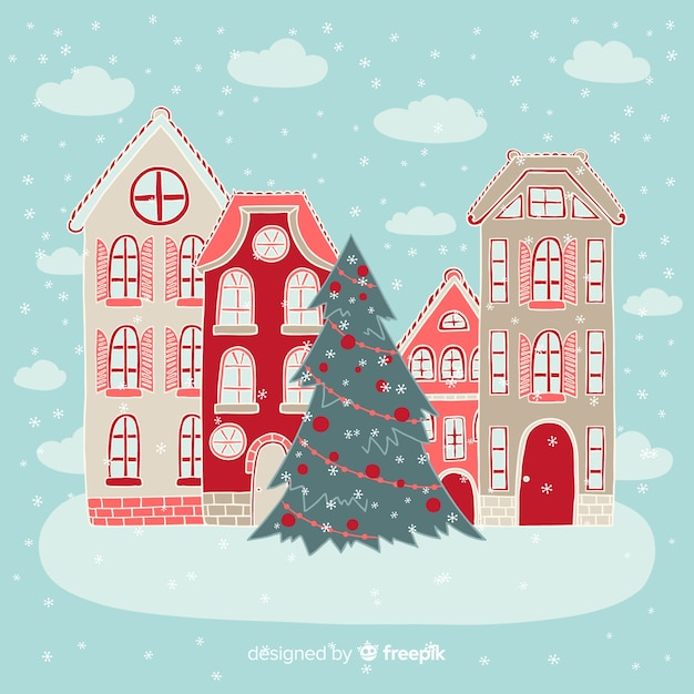 Gratis vector hand getrokken kerststad achtergrond