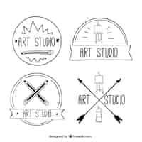 Gratis vector hand getrokken kunst logo's