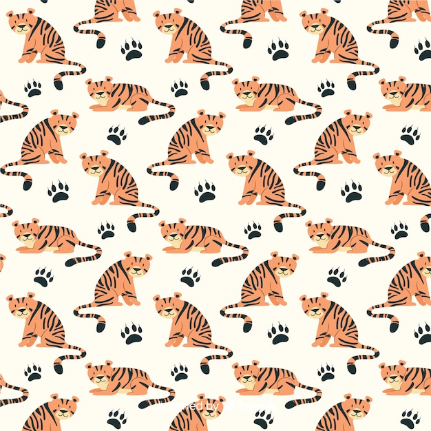 Gratis vector hand getrokken tijger patroon achtergrond
