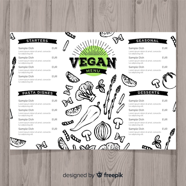 Gratis vector hand getrokken veganistisch restaurant menusjabloon