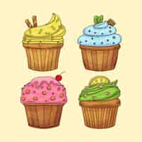 Gratis vector handgetekende cupcakes set