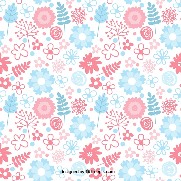 Gratis vector handgetekende patroon met roze en blauwe bloemendecoratie