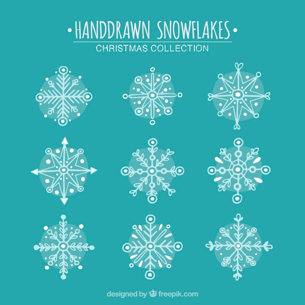 Gratis vector handgetekende sneeuwvlokken met geometrische ontwerpen