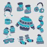 Gratis vector handgetekende winterkleding en essentials-collectie