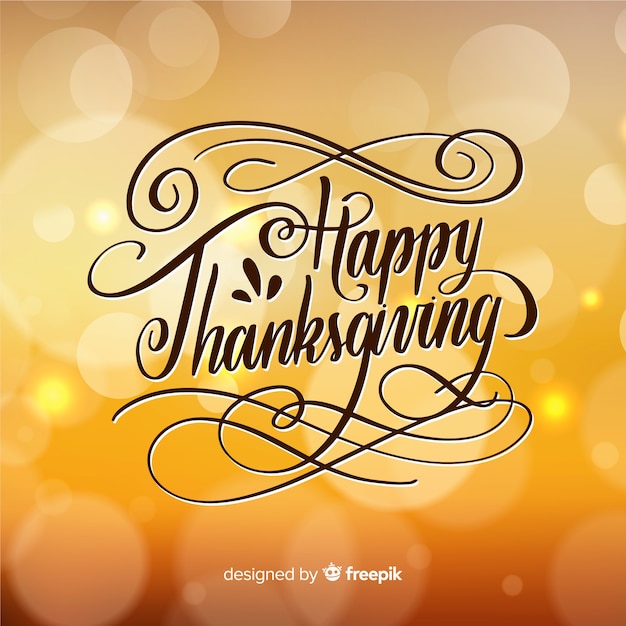 Happy thanksgiving belettering op onscherpe achtergrond