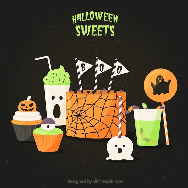 Gratis vector heerlijke cake met andere halloween suikergoed