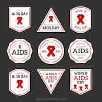 Gratis vector het verzamelen van wereld aids dag labels