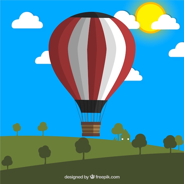 Gratis vector hete lucht ballonnen in een weide