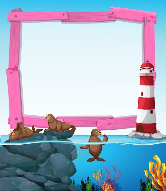 Houten frame met zeehonden onder water