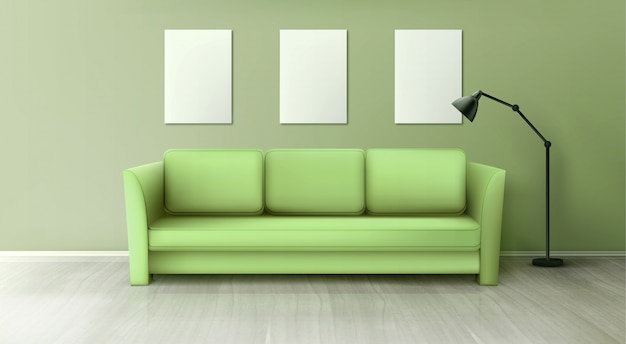 Interieur met groene bank, lamp en lege witte posters