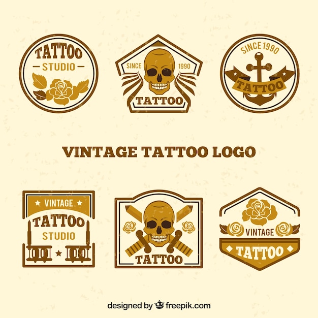 Gratis vector inzameling van vintage gouden tattoo logo