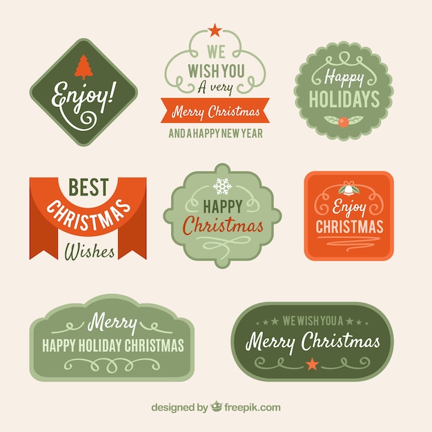 Gratis vector kerst badges collectie in rood en groen