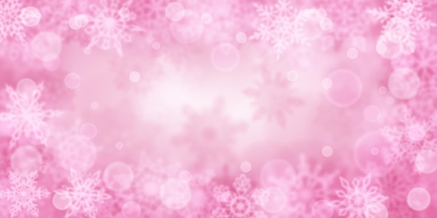 Kerstachtergrond van wazige sneeuwvlokken in roze kleuren