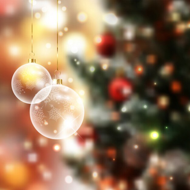 Gratis Vector kerstballen op een defocussed achtergrond