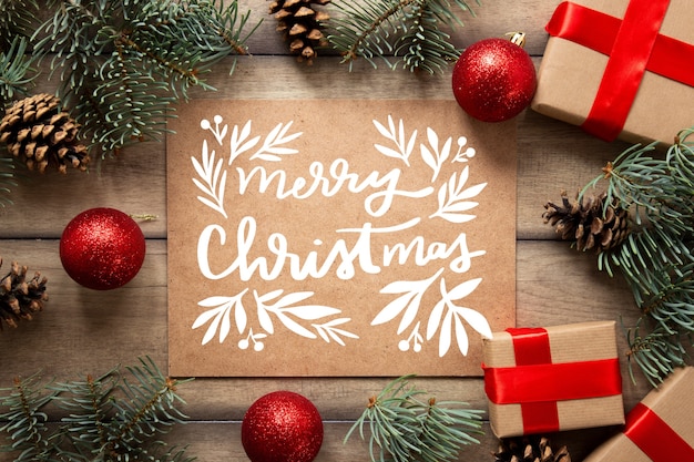 Gratis vector kerstfoto met letters en geschenken