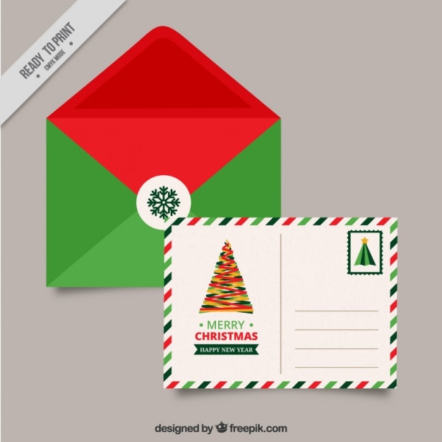 Kerstmis postkaart met groene en rode envelop