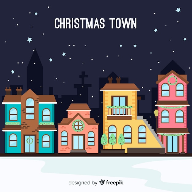 Gratis vector kerststad achtergrond in platte ontwerp