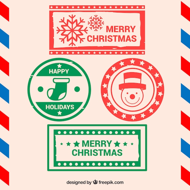 Gratis vector kerstzegels in rood en groen