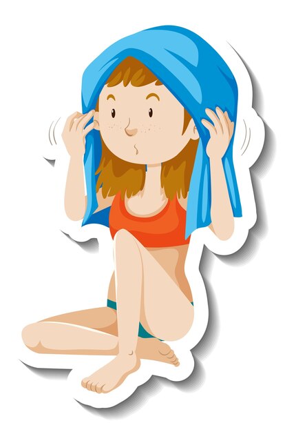 Meisje droogt haar haar met een sticker van een stripfiguur van een handdoek