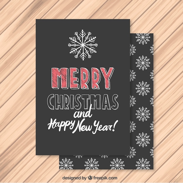 Gratis vector merry christmas kaart in het bord stijl