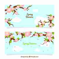 Gratis vector mooie banners met bloeiende takken voor de lente