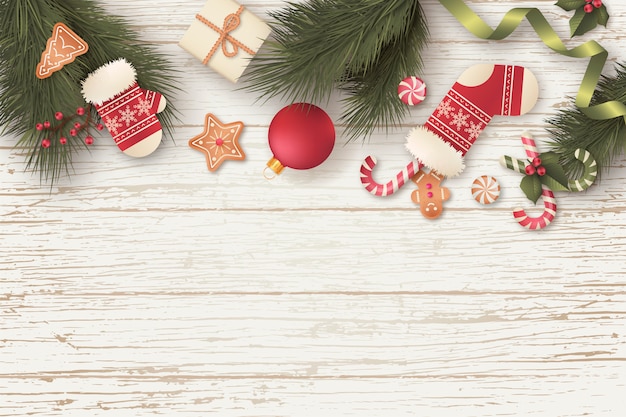 Gratis vector mooie kerst achtergrond met geschenken en ornamenten