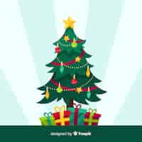 Gratis vector mooie kerstboom met plat ontwerp