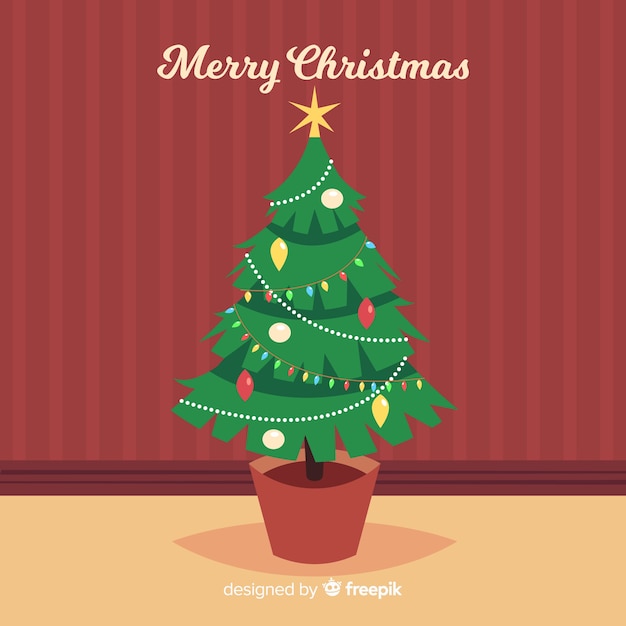 Gratis vector mooie kerstboom met plat ontwerp