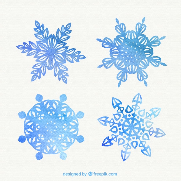 Gratis vector mooie sneeuwvlokken in aquarel stijl