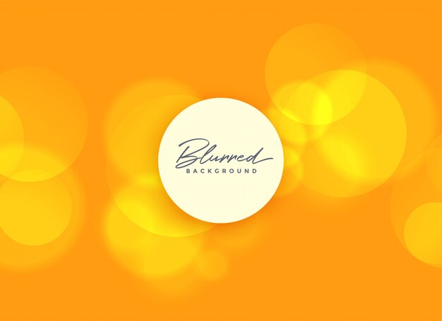 oranje achtergrond met wazig bokeh lichten
