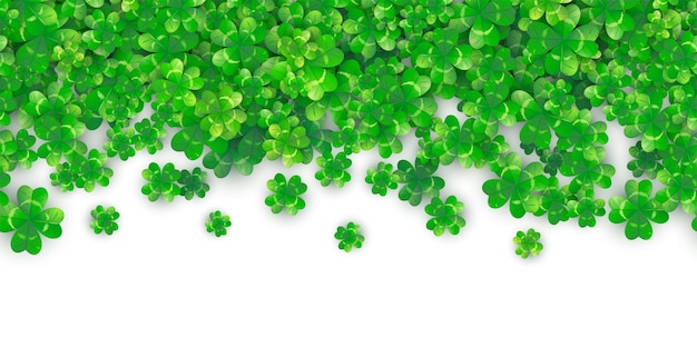 Gratis vector patricks day naadloze grens achtergrond met groene klaver heap