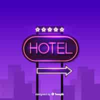 Gratis vector realistische het tekenachtergrond van het hotelneon