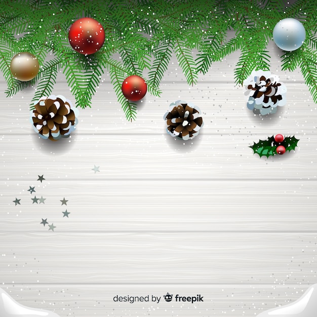 Gratis vector realistische kerstmisachtergrond met decoratie