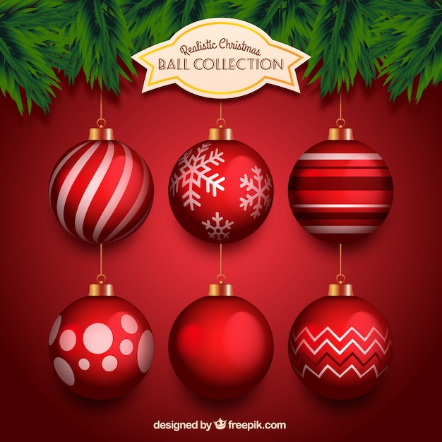 Gratis vector realistische verzameling van rode kerstballen