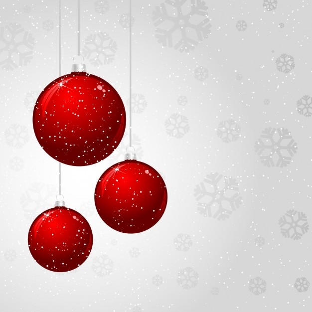 Gratis vector rode kerstballen op een witte achtergrond